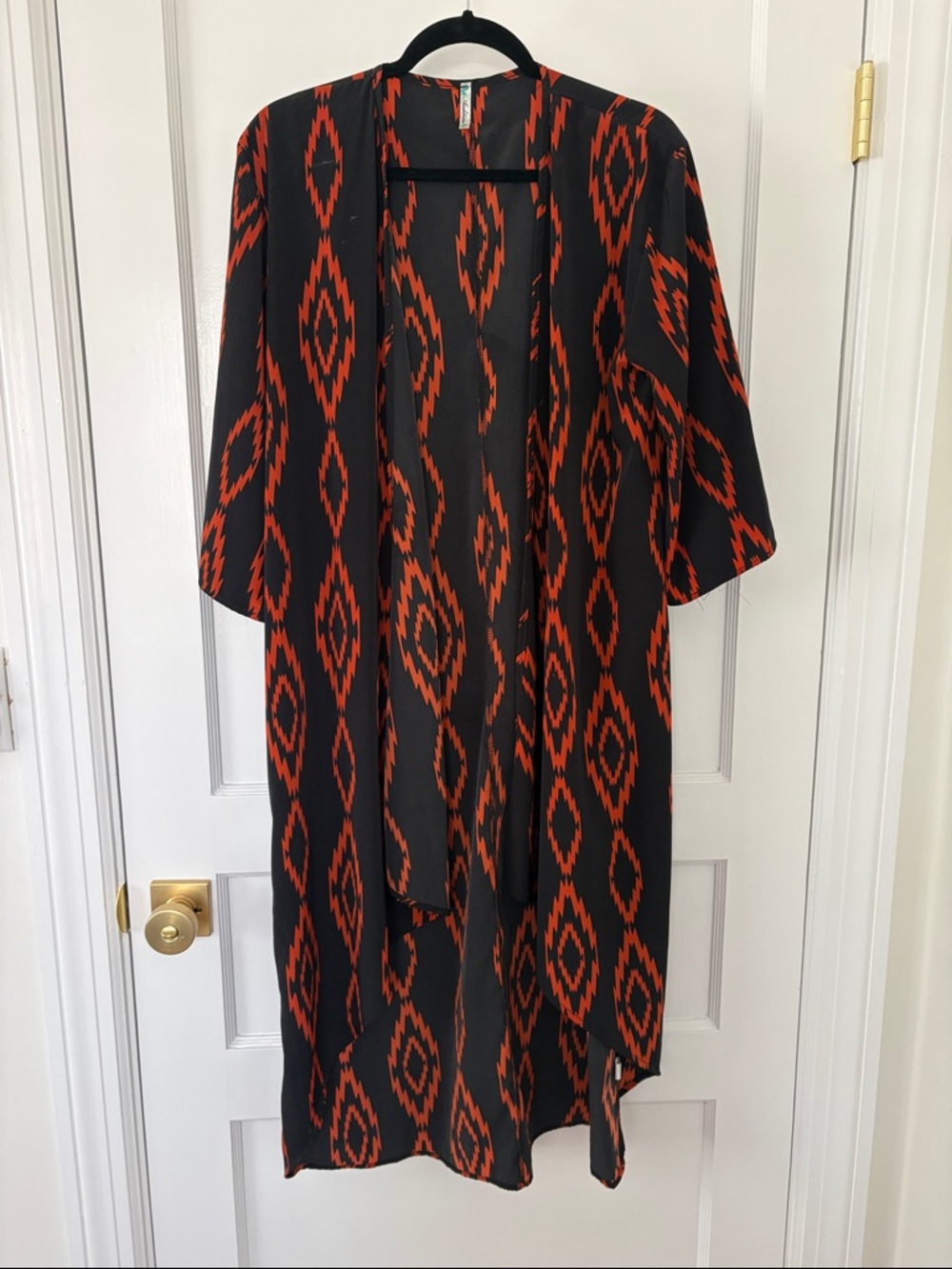 Auditions Black with Bright Orange Geometric Trim Top